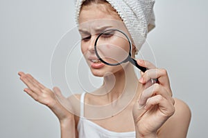 beautiful woman with a pimple on the face skin problems close-up