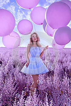 Beautiful woman with pink balloons in lavender field portrait background beauty portrait photoshoot