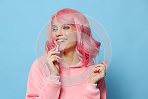 beautiful woman with pink hair lipstick makeup isolated background