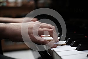 Beautiful woman playing piano, learn to play piano