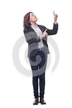 Beautiful woman pointing to the right side copyspace