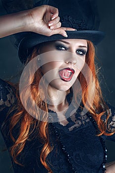 Beautiful woman portrait dressed as witch for Halloween party