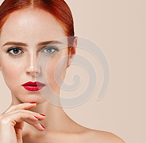 Beautiful woman portrait with perfect make up manicure red lips and nails