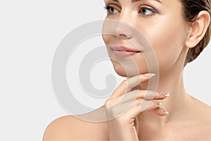 Beautiful woman portrait, skin care concept, beautiful skin. Portrait of female hands with manicure nails.