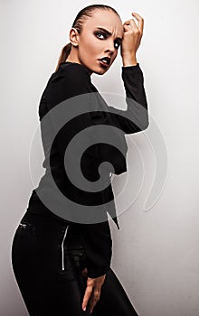 Beautiful woman pose in studio. Vogue style photo.