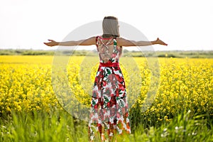 Beautiful woman posing in field