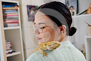 Beautiful Woman Posing with Her Adorable Bearded Dragon Pets