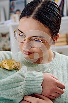 Beautiful Woman Posing with Her Adorable Bearded Dragon Pets