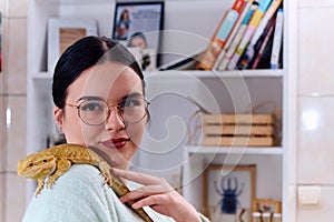 Beautiful Woman Posing with Her Adorable Bearded Dragon Pets