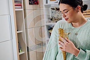 Beautiful Woman Posing with Her Adorable Bearded Dragon Pets