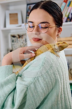 Beautiful Woman Posing with Her Adorable Bearded Dragon Pets