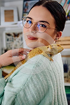 Beautiful Woman Posing with Her Adorable Bearded Dragon Pets