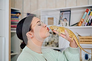 Beautiful Woman Posing with Her Adorable Bearded Dragon Pets