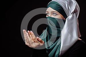 Beautiful woman is practising Islam