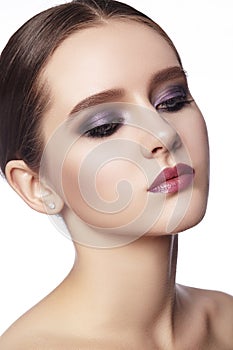 Beautiful Woman with Professional Makeup. Celebrate Style Eye Make-up, Perfect Eyebrows, Shine Skin. Bright Fashion Look