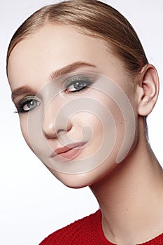 Beautiful Woman with Professional Makeup. Celebrate Style Eye Make-up, Perfect Eyebrows, Shine Skin. Bright Fashion Look