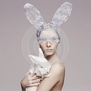 Beautiful woman with rabbit