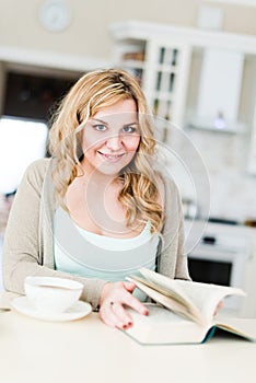 Beautiful woman reads an interesting book