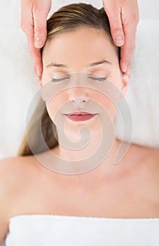 Beautiful Woman Receiving Head Massage At Health Spa