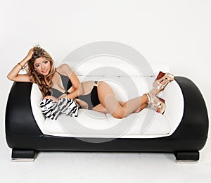 Beautiful woman reclining in chair