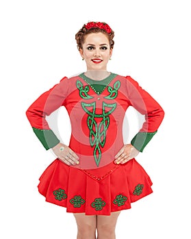 Beautiful woman in red dress for Irish dance isolated