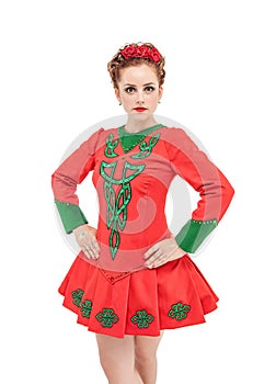 Beautiful woman in red dress for Irish dance isolated