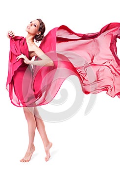 Beautiful woman in red flying dress