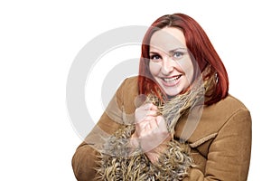 Beautiful woman with red hair in winter coat