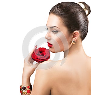 Beautiful woman with red rose