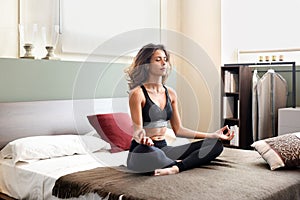 Beautiful woman relaxing doing yoga