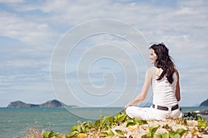 Beautiful woman relaxing on tropical beach