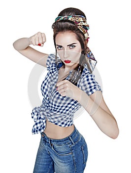 Beautiful woman in retro pin-up style with her fists up, ready t