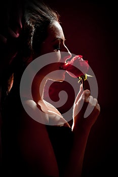 Beautiful woman with a rose