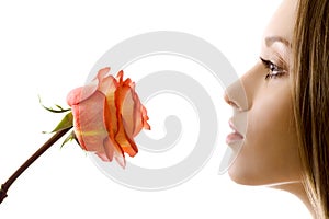 Beautiful woman with rose sideview isolated