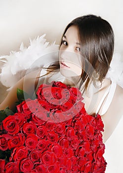 Beautiful woman with roses