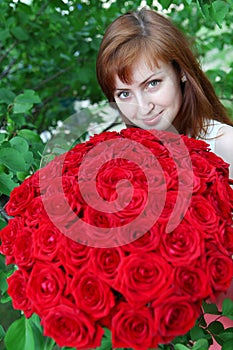 Beautiful woman with roses