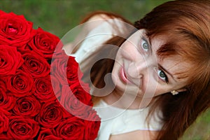 Beautiful woman with roses