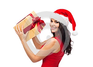 Beautiful woman in santa hat with gift box