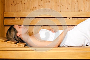 Beautiful woman in a sauna