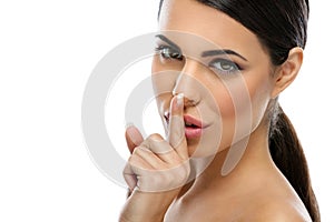 Beautiful woman saying shh