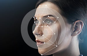 Beautiful woman with scanning grid on her face against black background, space for text. Panorama