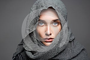 Beautiful woman in scarf.arabian fashion photo
