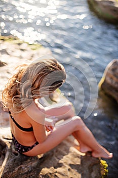 Beautiful woman by the sea