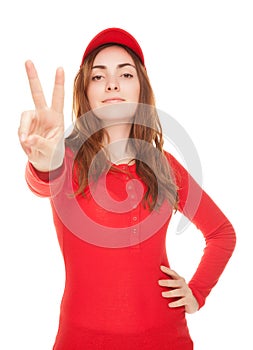 Beautiful woman showing victory sign or peace isolated on white