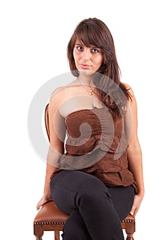 Beautiful woman sitting on a chair