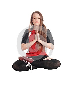 Beautiful woman sitting in joga pose