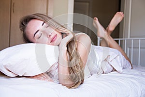 Beautiful woman sleep on bed at the morning, hotel and spa, insomnia, lifestyle