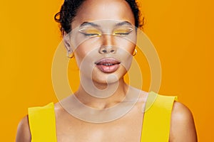 Beautiful woman smile make-up black cosmetic portrait african beauty creative yellow colourful face