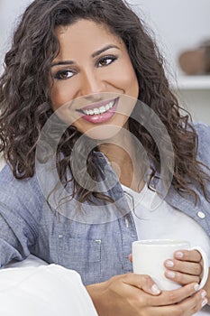 Beautiful Woman Smiling Drinking Tea or Coffee