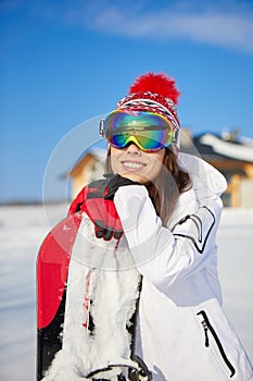 Beautiful woman with a snowboard. Sport concept